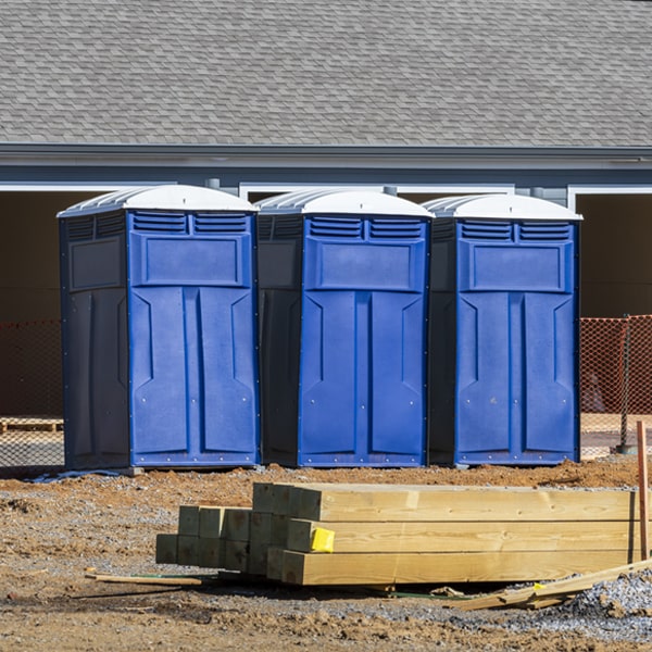 are there any restrictions on what items can be disposed of in the portable toilets in Le Claire